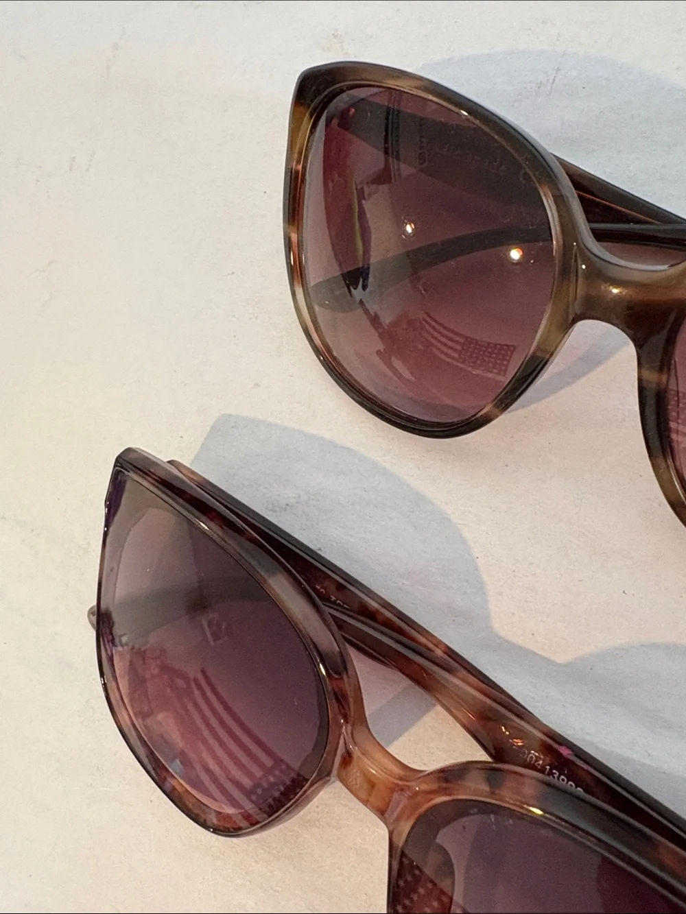 Set of Two Sunglasses one Kate Spade and the other brand will be listed
